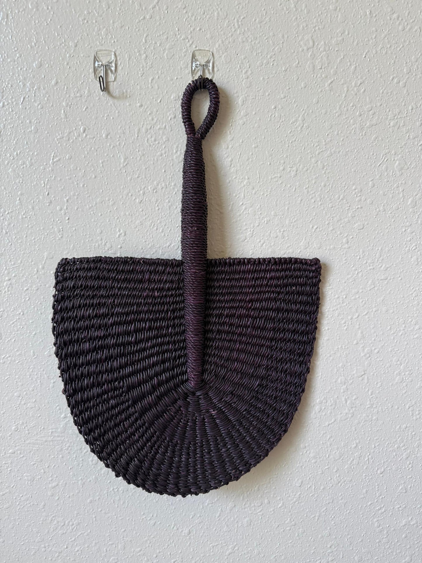A hand-woven African fan