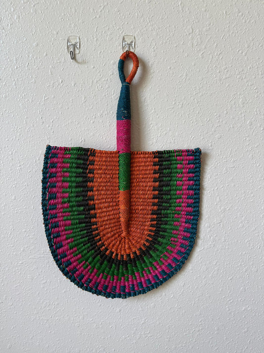 A hand-woven African fan